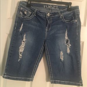 Distressed denim shorts